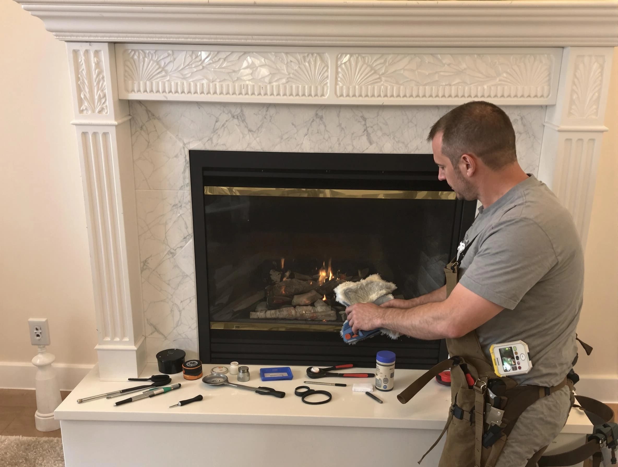 North Druid Hills Chimney Sweep performing fireplace maintenance in North Druid Hills, GA